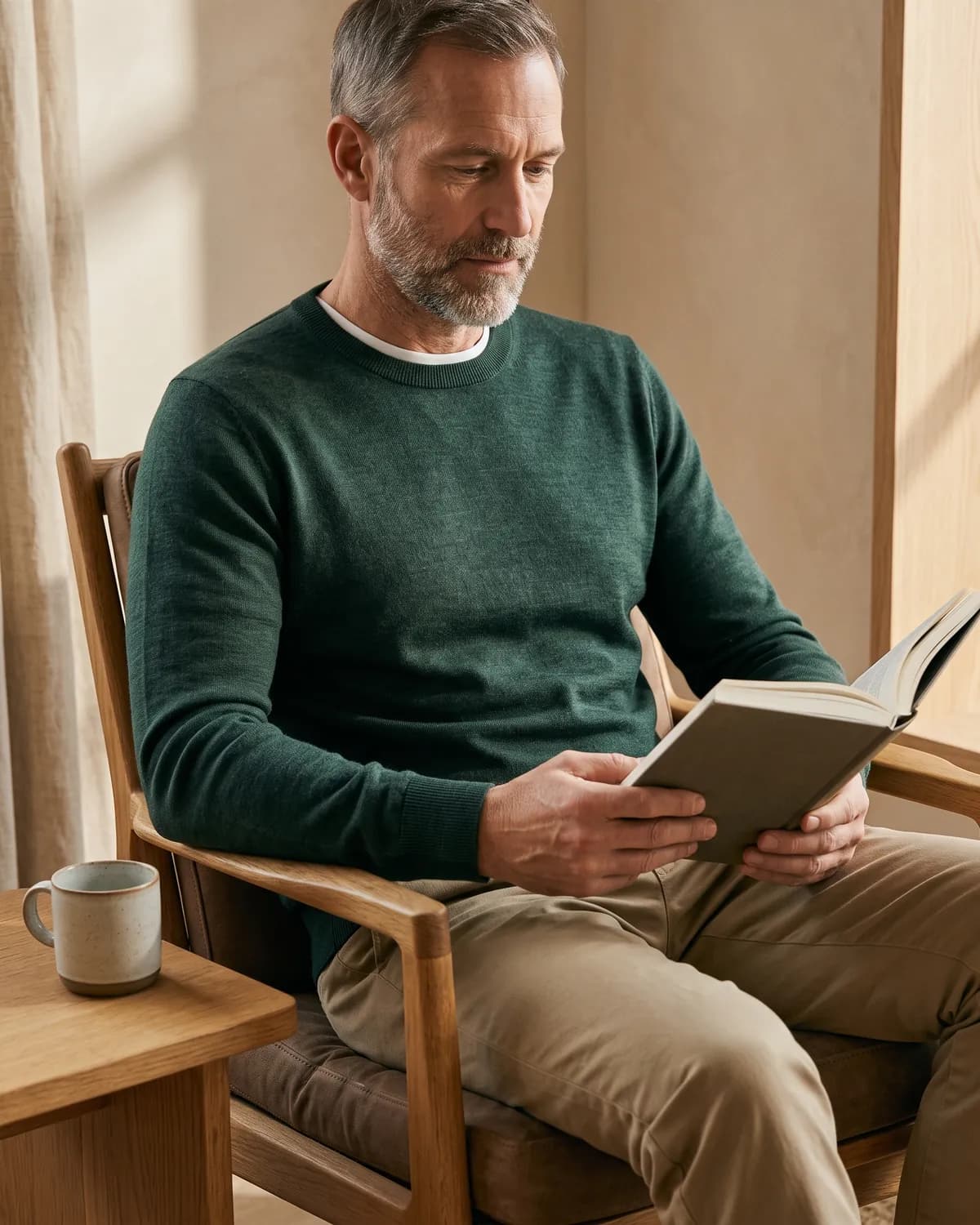 A model wearing the Merino Crew Sweater